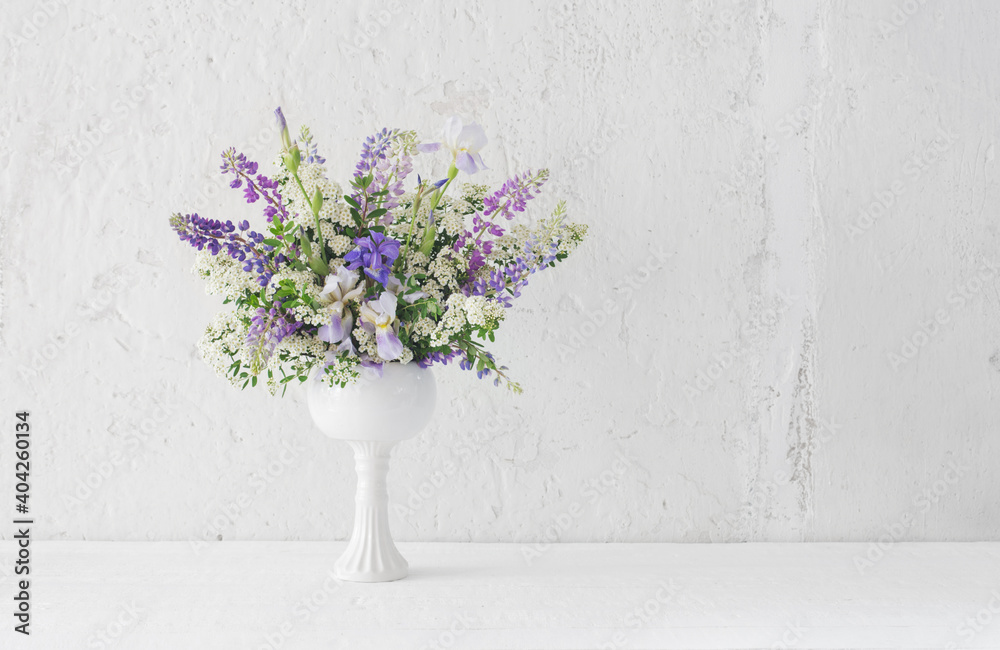 summer bouquet iin white vase  on white background