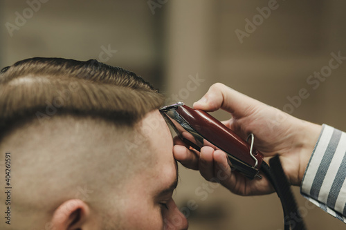 trimming of hair in barber shop
