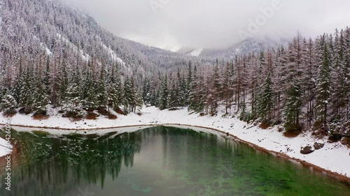 A drone shot of Green Lake in Austrian Alps. Aerial view of winter landscape of gruner see lake in Styria.