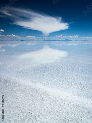Original cloud reflected in Uyuni salt flat, Bolivia