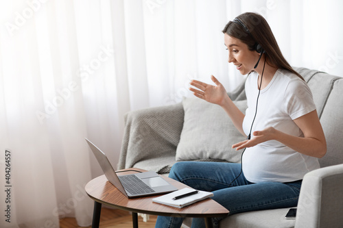 Remote Work. Happy Pregnant Female Tutor Making Online Video Lesson With Laptop