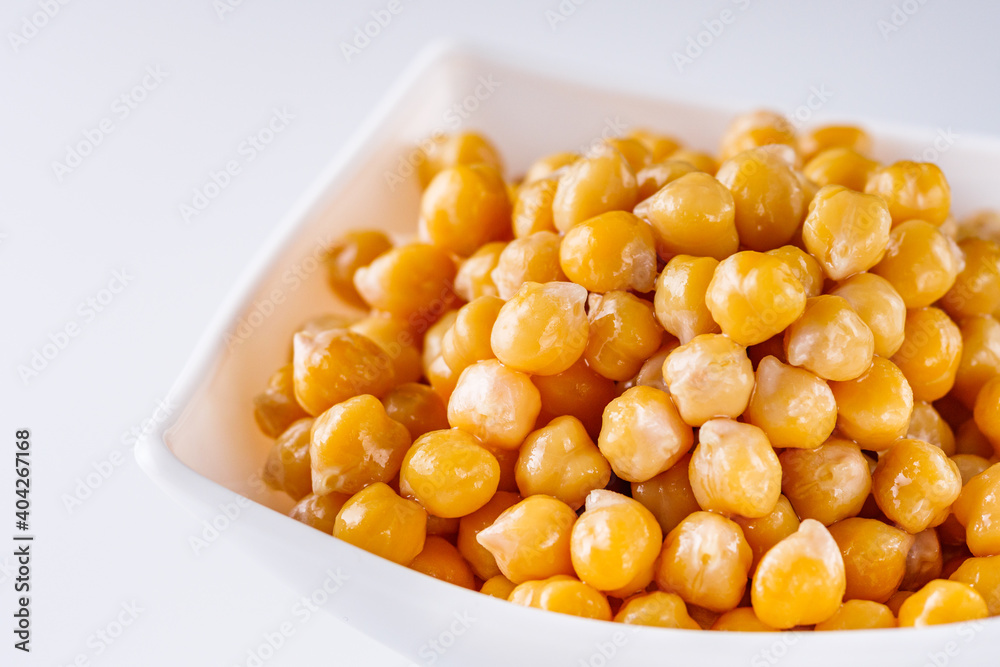 boiled chickpeas on a white acrylic background boiled chickpeas on a white acrylic background