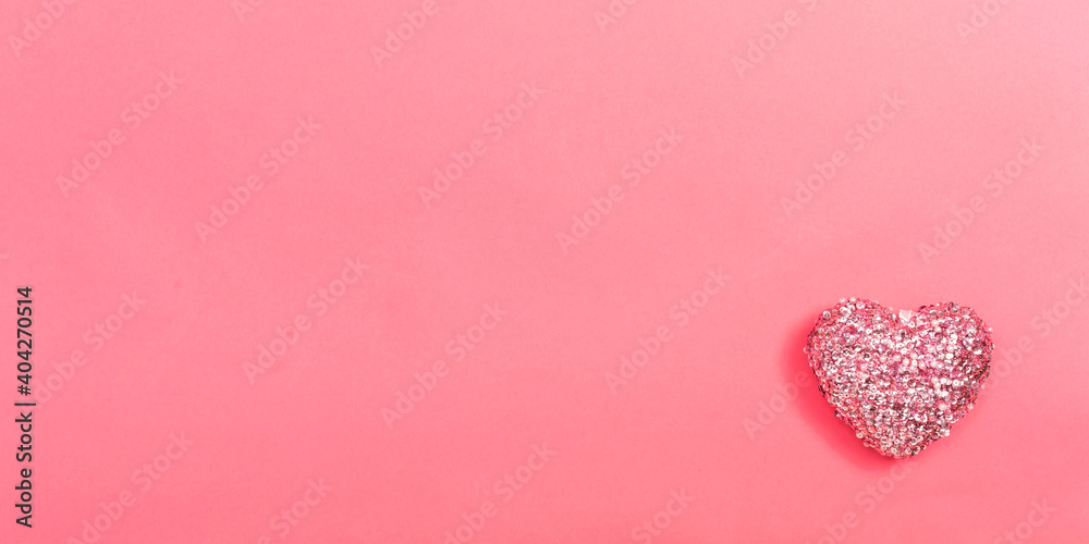 Valentine's day heart ornaments on a pink background