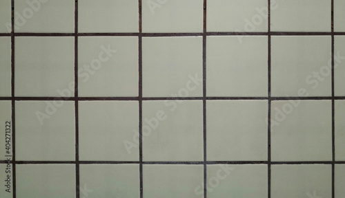 Wall tiles square background. Tiled background