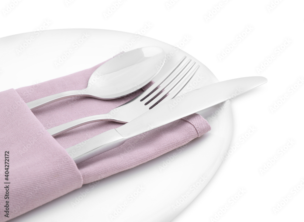 Plate with clean cutlery and napkin isolated on white Plate with clean cutlery and napkin isolated on white