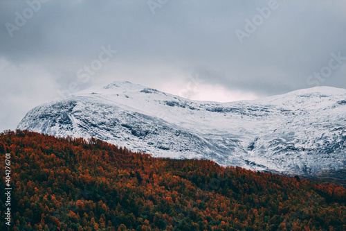 snow covered mountains in the fall