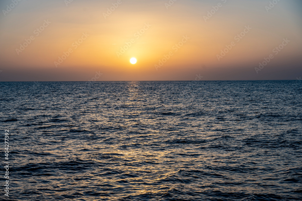 ordering the sun from the half of a ship on the Red Sea