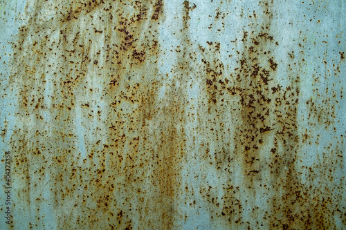rust texture on green-blue paint