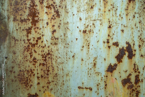 rust texture on the paint. large rust spots on the metal surface