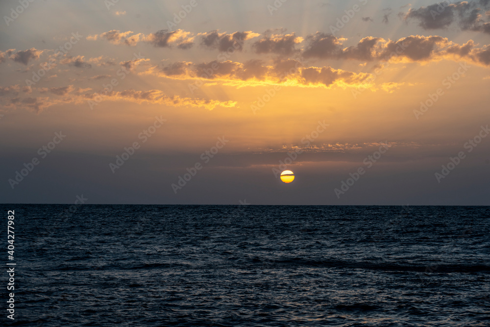 ordering the sun from the half of a ship on the Red Sea