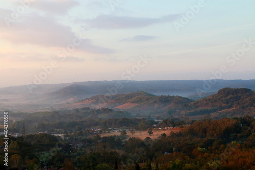 The scenery on the top of the mountain in the morning, mountain peaks in morning fog,Thailand. 