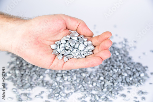 silver nuggets in hand