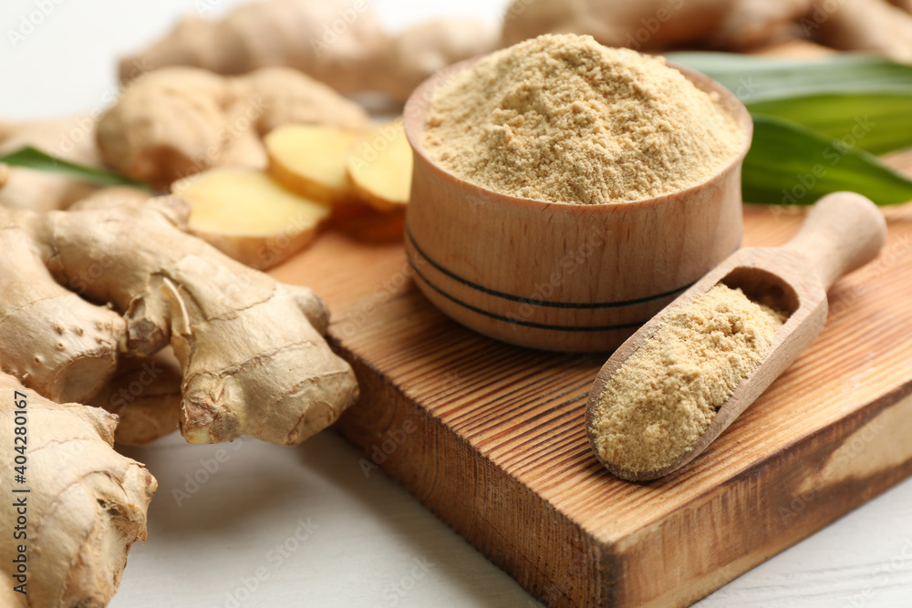 Dry and fresh ginger on white table Dry and fresh ginger on white table