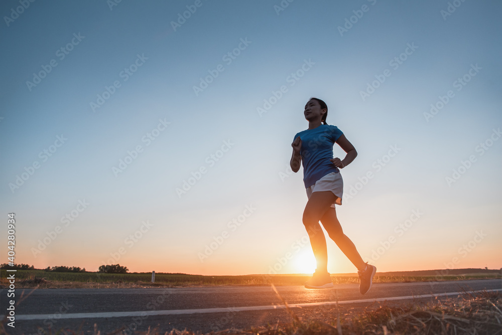 Young woman with runner on the street be running for exercise.