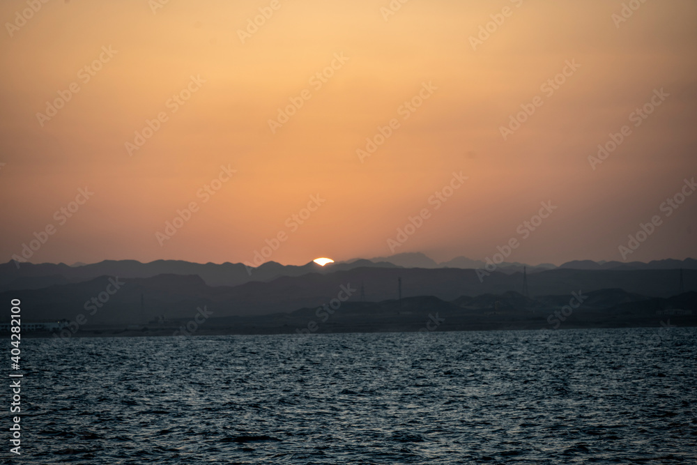 sunset from a yacht sailing in the Red Sea