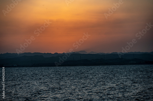 sunset from a yacht sailing in the Red Sea