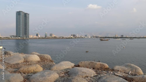 Ras Al Khaimah City in the United Arab Emirates pan on a cloudy day. photo