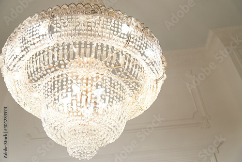 Chrystal chandelier close-up. Glamour background with copy space. Selective focus.
