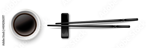 Sushi chopsticks and soy sauce in bowl. Chinese or Japanese cuisine elements for eating vector illustration. Black wooden pair of sticks and plate with soya on white background