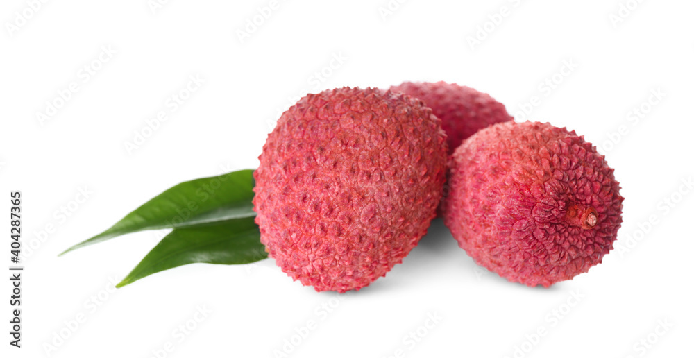Fresh ripe lychees with green leaves on white background Fresh ripe lychees with green leaves on white background