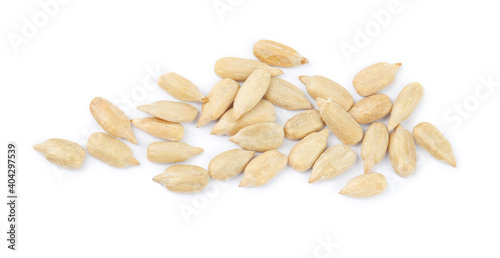 Peeled sunflower seeds on white background, top view