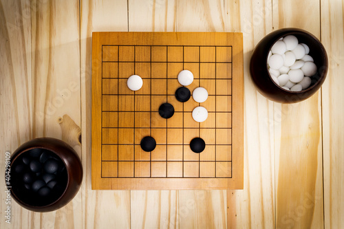 Go Game, Goban, Baduk or Weiqi (Chinese Board Game) Background photo