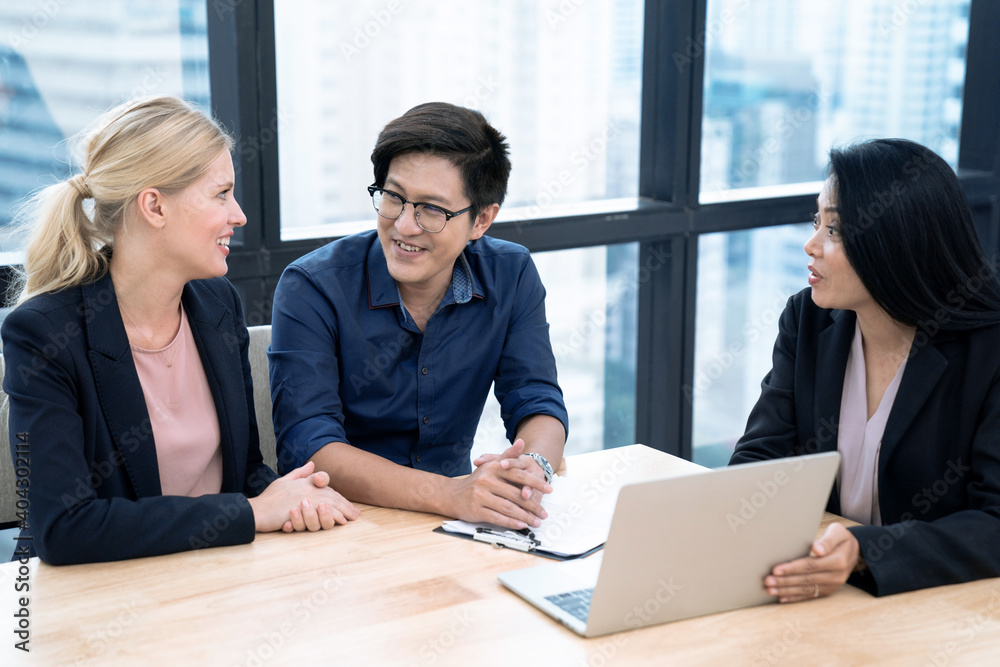 Estate agent shaking hands with customer after contract signature, Successful lawyer giving consultation to family couple about buying house. Estate agent shaking hands with customer after contract signature, Successful lawyer giving consultation to family couple about buying house.