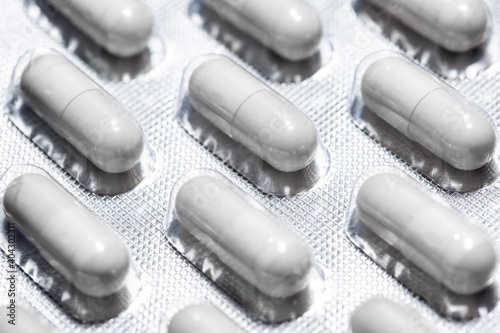Foto Close up of capsules pills in a blister pack, pharmaceutical and pharmacy concep