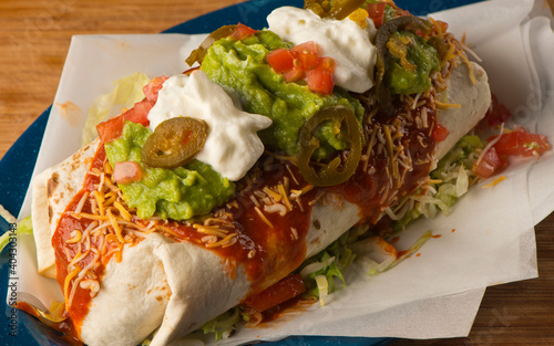 Burritos or tacos. Mexican or Tex-Mex food favorite. Seasoned meat, refried or black beans, Mexican rice, cheese, fried vegetables wrapped in homemade tortillas and served with salsa. Takeout favorite