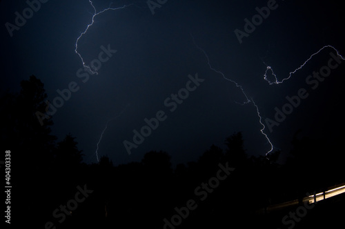 huge lightning during a thunderstorm storm rain thunder hurricane night sky in lightning молния