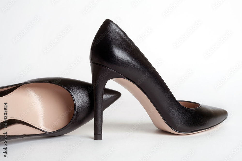 Black high heels on white background Black high heels on white background