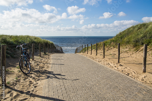 Way to the beach over the cordoned off dunes.