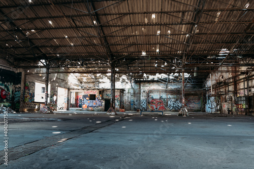 An old ailing warehouse with holes in the roof, abandoned places