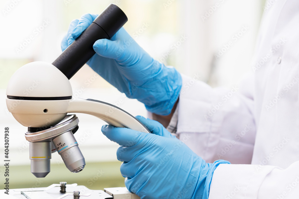 Professional microscope on a workplace in a laboratory Professional microscope on a workplace in a laboratory