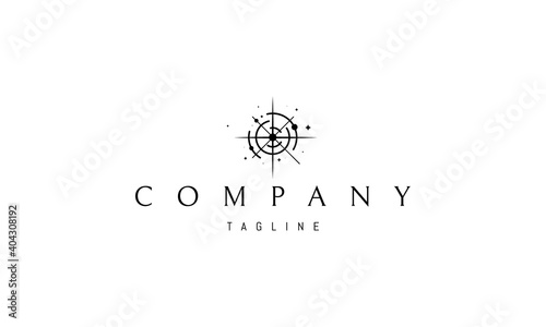 Vector logo on which an abstract image of a space compass.