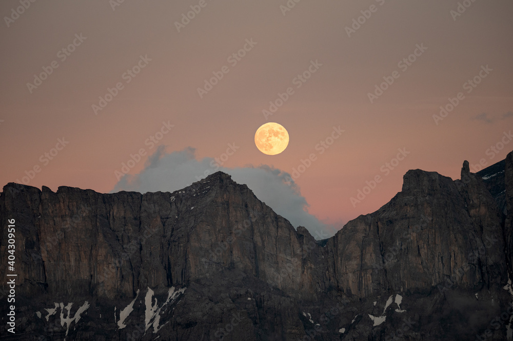 Moon right above the Alps