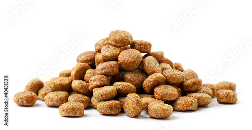 Heap of dry dog food on a white background. Isolated
