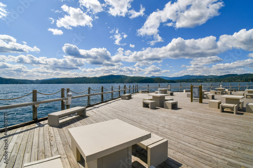 An expansive deck along Lake Coeur d'Alene, part of the world's longest floating boardwalk at the resort at Coeur d'Alene, Idaho, USA