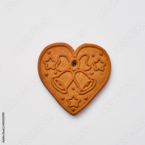 New Year gingerbread or heart shaped cookies isolated on white background. Square image. Top view.
