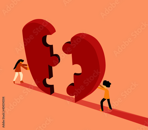 two person completing love puzzle