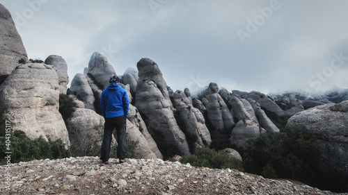 Man in Montserrat Mountain close to Barcelona, catalonia, Spain photo