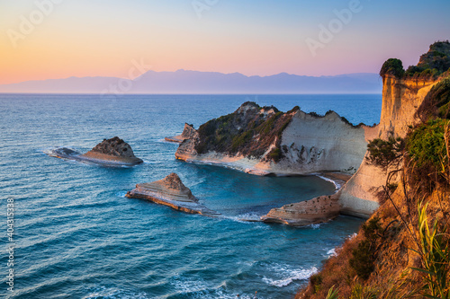 Corfu, Greece. Cape Drastis cliffs at sunset. © SCStock