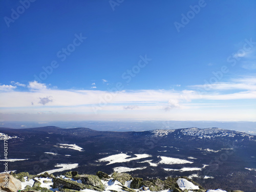 Peak of the mountain Iremel, Bashkortostan, Chelyabinsk region. Winter, blue sky. photo