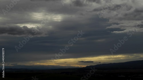 Time lapse of dark dramatic forming storm clouds with natural light effects. 