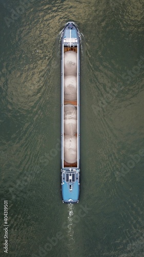 Blue cargo boat cross up the Liege channel © Komelin