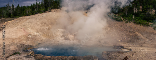 Close up of boiling blue water in thermal laguna in yellowstone national park in americ