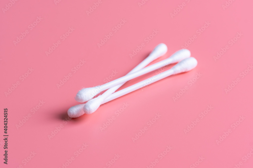 Cotton buds, ear sticks on pink background. Cotton buds, ear sticks on pink background.