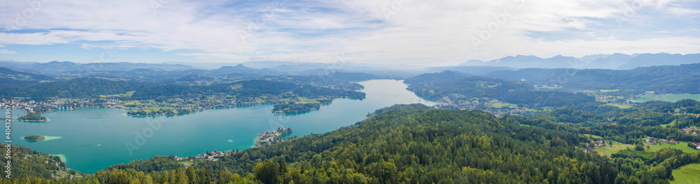 Aerial view of the alpine lake Worthersee, famous tourist attraction for many water activity in Klagenfurt, Carinthia, Austria