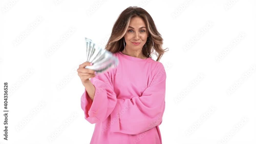 Cheerful woman posing with fan of cash money enjoy richness isolated. Shot with RED camera in 4K Cheerful woman posing with fan of cash money enjoy richness isolated. Shot with RED camera in 4K