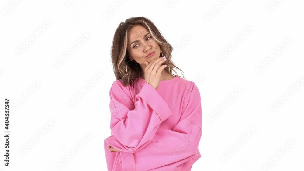 Pensive woman brainstorming touching chin having idea gesture posing isolated. 4k Dragon RED camera Pensive woman brainstorming touching chin having idea gesture posing isolated. 4k Dragon RED camera